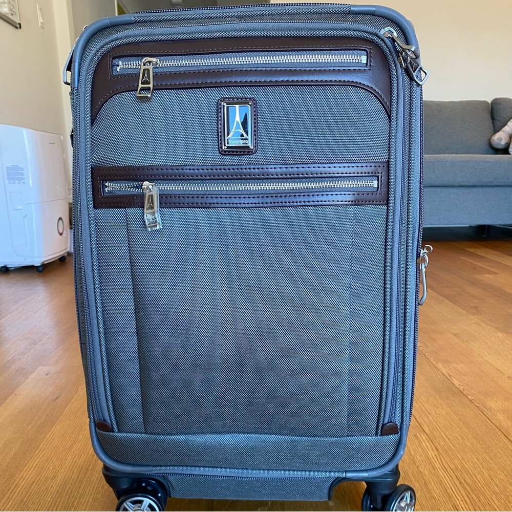 Travelpro® Platinum® Elite 21” Expandable Carry-On Spinner